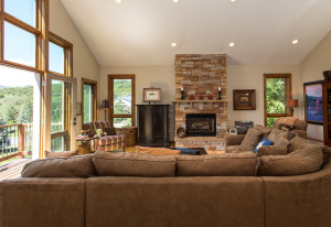 Dry stack rock fireplace in living room.